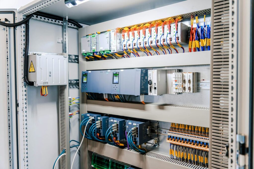 Industrial electrical control panel with wiring and modules
